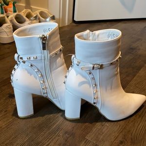 White heeled boots